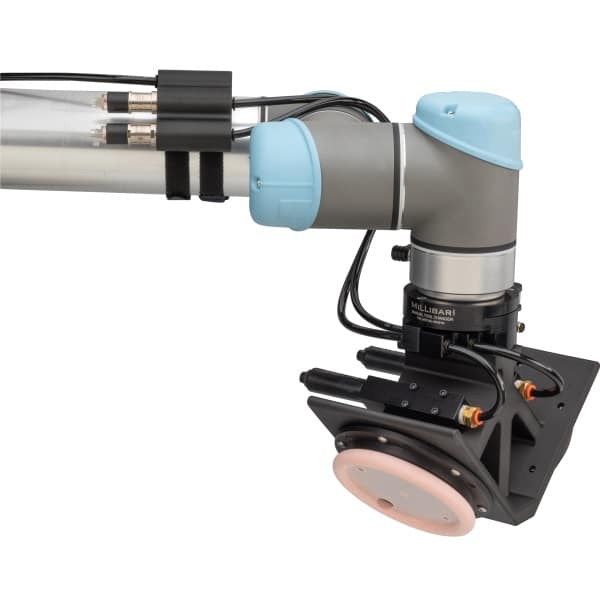 Dual head vacuum gripper for grinding flash from molded part